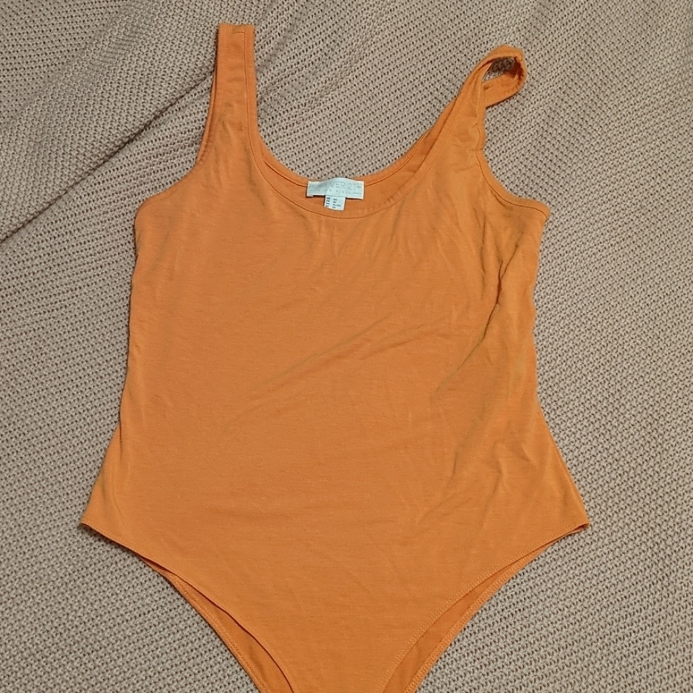Orange leotard.